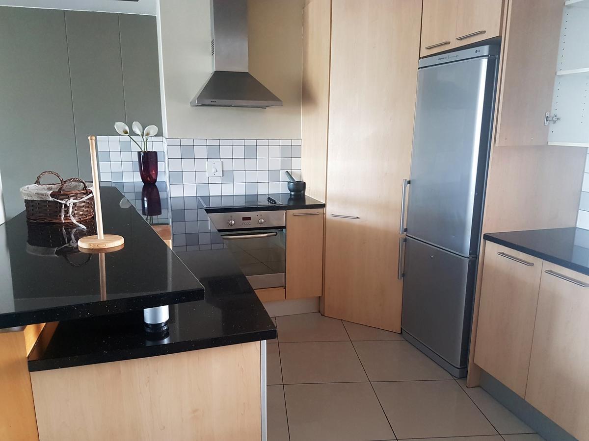 Weom Apartments Сэндтон Экстерьер фото